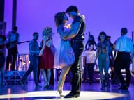 Baby and Johnny dancing together in a Dirty Dancing production photograph