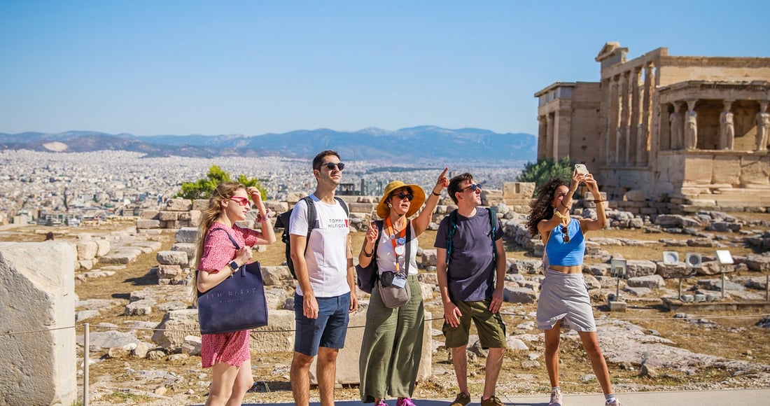 Guided tour group in front of the Parthenon on the Acropolis of Athens