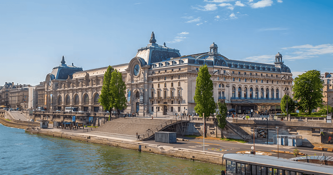 Musée d'Orsay riverside façade and famous clock window above the former railway concourse