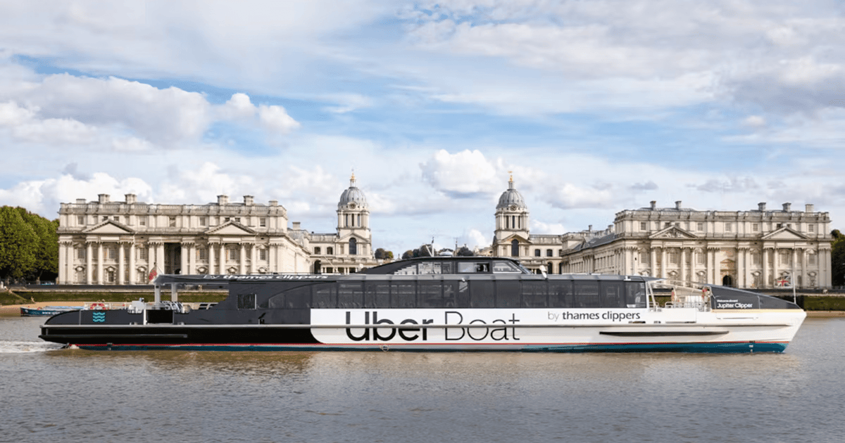 Uber Boat by Thames Clippers catamaran on the Thames passing central London landmarks