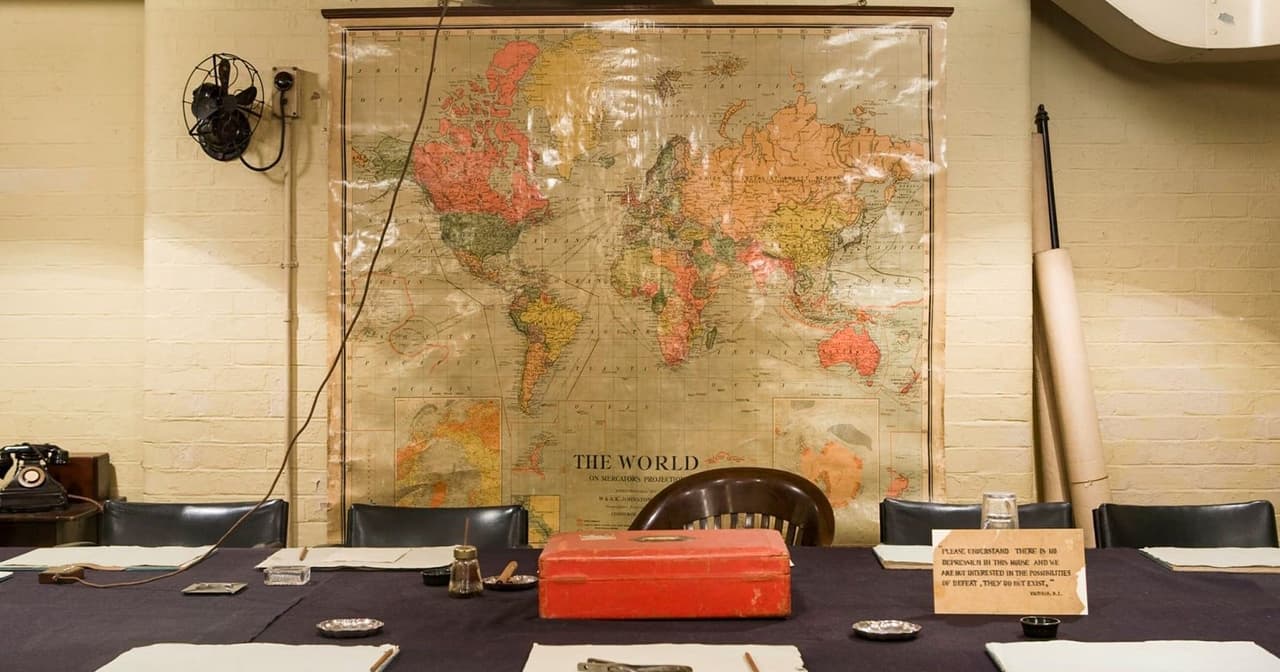 Meeting room with world map in Churchill War Rooms, London.