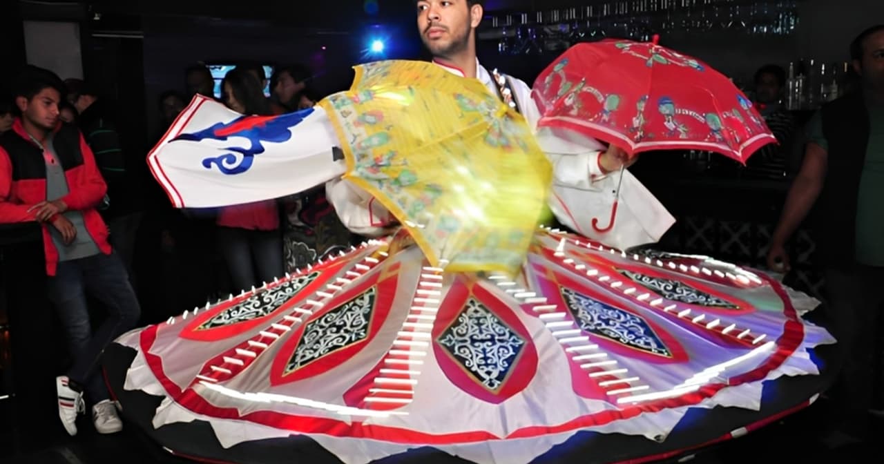 Tanoura whirling dancer in a bright spinning skirt performing at an evening show in Cairo