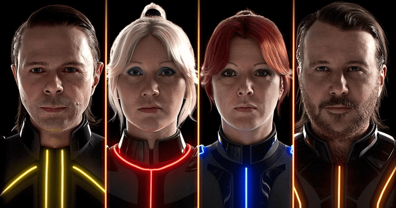 The four ABBA avatars in their illuminated Voyage costumes