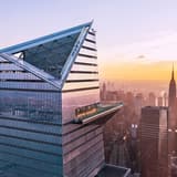 The New York City skyline at sunset seen from a high observation deck