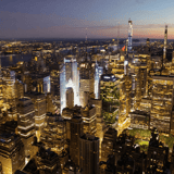 The Empire State Building above the Manhattan skyline on a summer evening