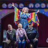 Dame Maureen Lipman in a rainbow cape with the cast of Allegra at the Harold Pinter Theatre