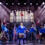 Veronica Sawyer and the cast of Heathers The Musical on stage at New World Stages