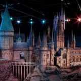 The giant 1:24 scale model of Hogwarts castle lit up at Warner Bros. Studio Tour London