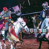 Two armored knights jousting on horseback at Tournament of Kings in Las Vegas