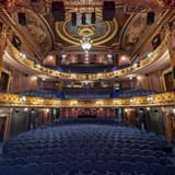 The gilded auditorium of the Theatre Royal Haymarket in London's West End, seen from the stage