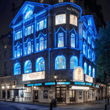 The Novello Theatre on the Aldwych lit up in blue at night