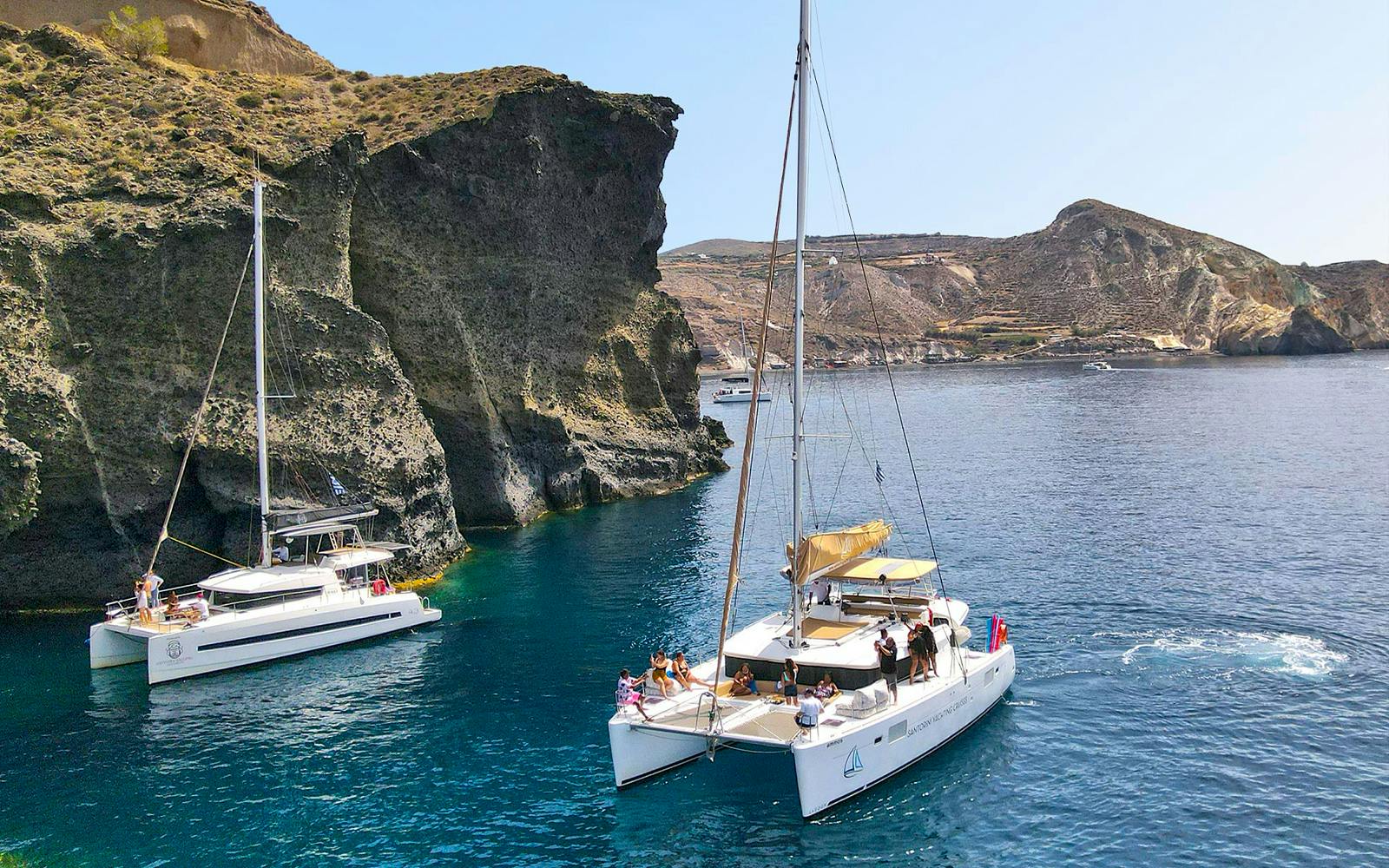 Santorini Luxury Catamaran Cruise with Meal, Drinks & Transfers