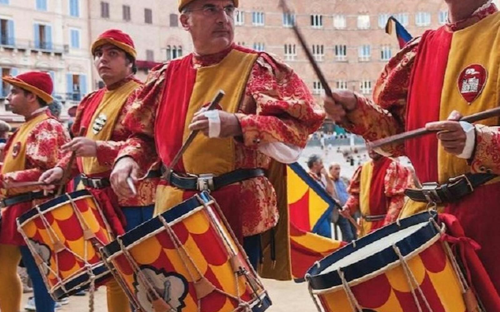 Siena: Guided Walking Tour + Contrada Museum Entry tickets at Siena Outdoor Activities, Siena