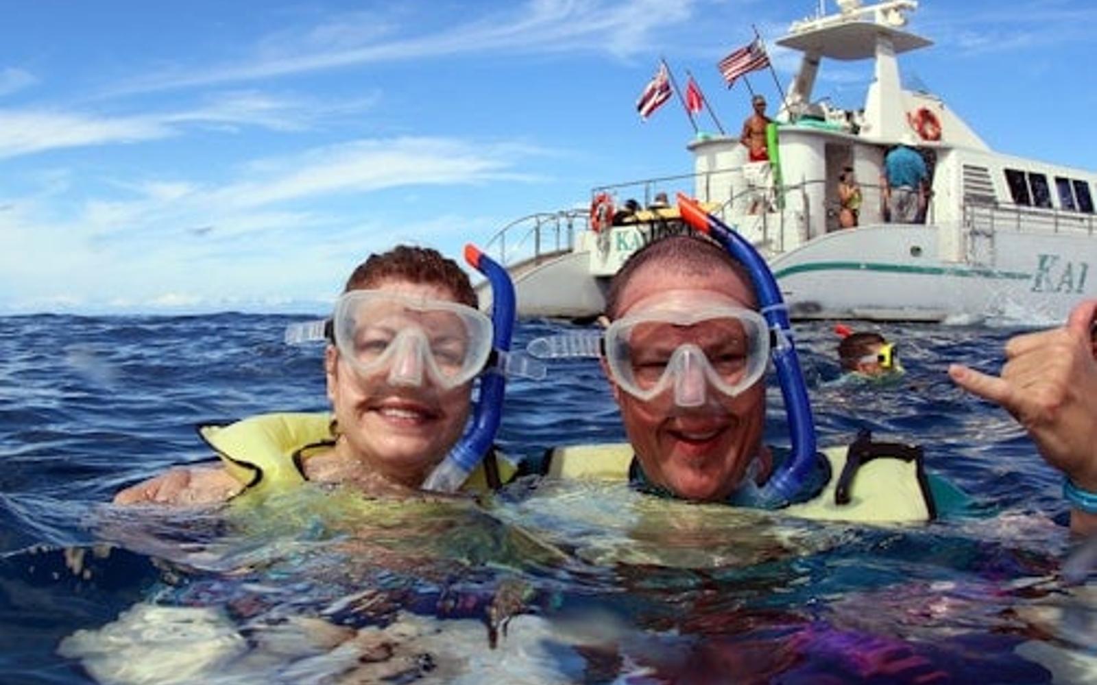 Oahu: Guided Dolphin Watching Sunset Cruise + Snorkeling + Buffet tickets, Hawaii