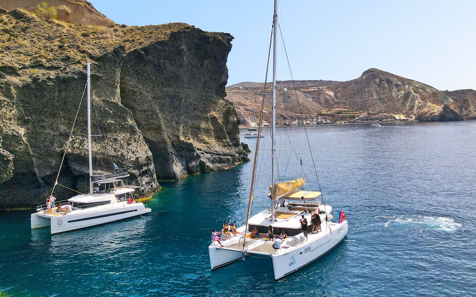 Santorini Luxury Catamaran Cruise with Meal, Drinks & Transfers