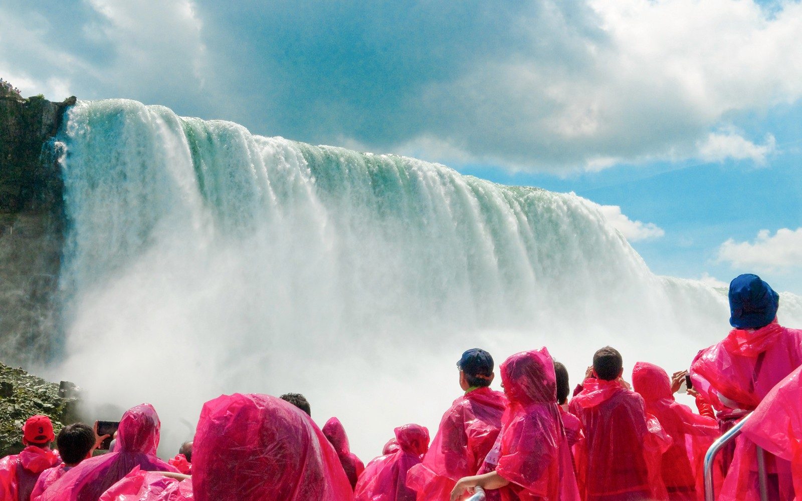From Toronto: Niagara Falls Day Tour with Hornblower Cruise, Journey Behind the Falls, and Optional Skylon Tower