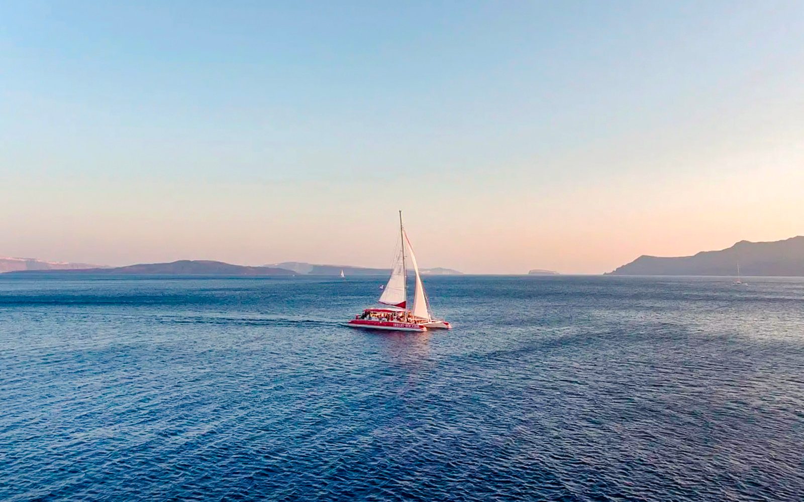 Santorini Catamaran Cruise with Greek BBQ & Drinks