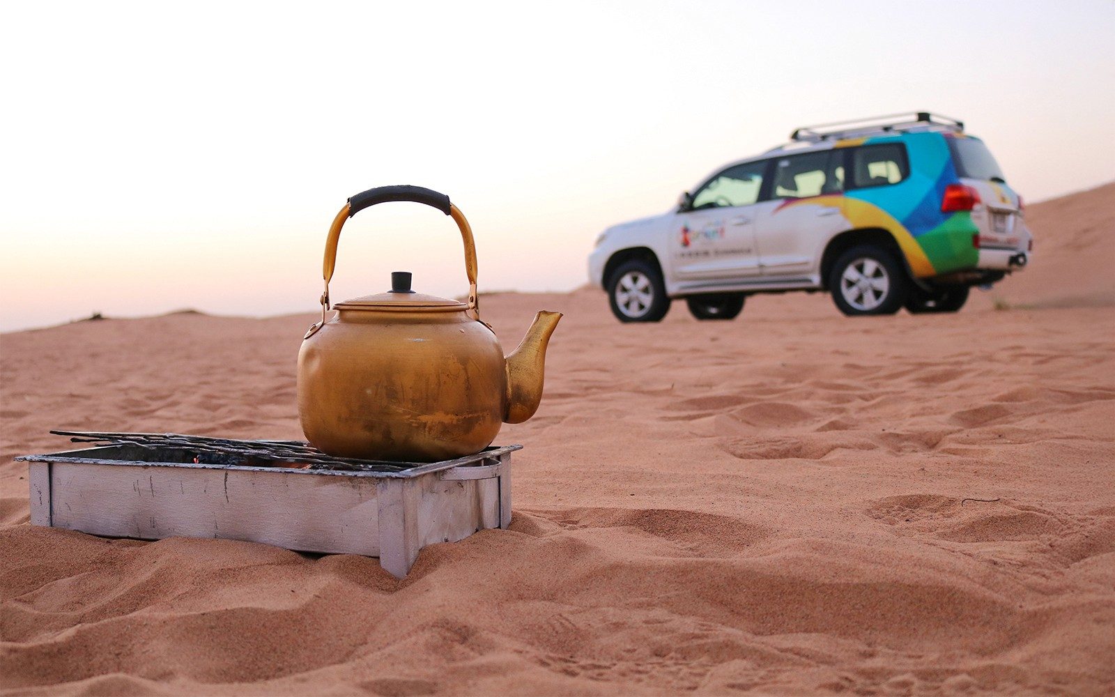 Abu Dhabi Sunrise Desert Safari with 4x4 Dune Bashing & Sandboarding