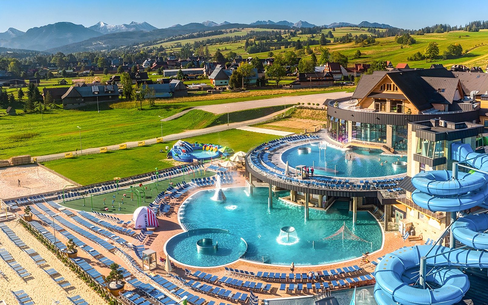 From Krakow: Zakopane Snowmobiles and Thermal Bath Tour