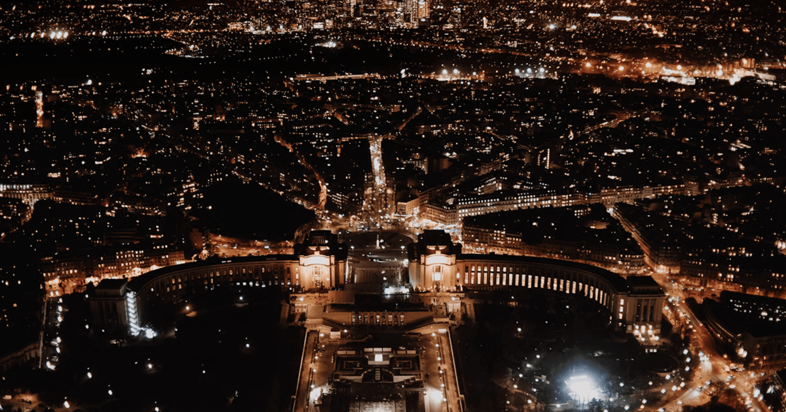 View of Paris at night from the top of the Eiffel Tower