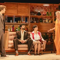 Stage scene from Abigail's Party in Westend with actors in a 1970s living room setting