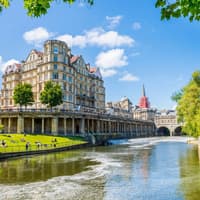 Historic architecture along the River Avon in Bath, England, featured in the Bridgerton Tour — Bridgerton: 1.5 Hour Guided Tour of Filming Locations in Bath with Music