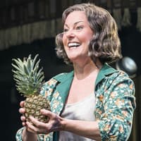 Performer holding a pineapple during Cabaret Westend show