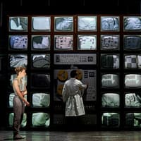 Control room scene from Stranger Things: The First Shadow with characters and vintage monitors