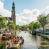 Amsterdam: 1-Hour Luxury Evening Canal Cruise on Heated Saloon Boat with Onboard Bar — gallery 1