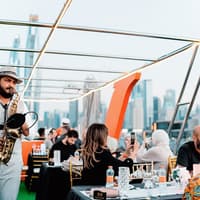 From Dubai Marina: 1.5-Hour Sunset/Dinner Cruise with Open Bar, Live Music & International Buffet — gallery 2