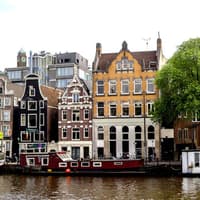 Roundtrip Bus from Schiphol Airport to Amsterdam City Center + Audio Guide App — gallery 1