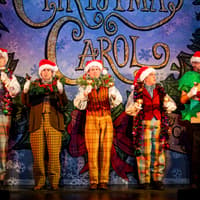 Production photograph from Christmas Carol Goes Wrong