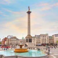 Nelson's Column at Trafalgar Square with fountains and surrounding buildings in London, UK — The National Gallery of London Private Half-Day Walking Tour