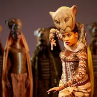 Performer in lioness costume during The Lion King West End show