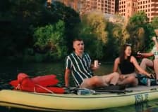 Giant Paddleboarding at Sunset with Bats