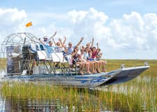 Miami: Everglades Airboat Tour with Reptile Exhibit & Optional Transportation