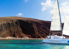 Santorini: Classic Catamaran Cruise + BBQ + Drinks + Transfers