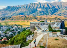 From Tirana: Gjirokastra UNESCO Town, Castle & Ardenica Monastery Guided Day Trip