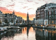 Amsterdam: Day Trip from Brussels with Cheese, Clogs & Windmills