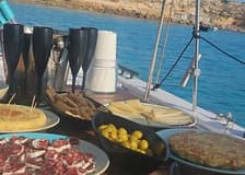 Ibiza: Boat Trip with Banana Boat, Food & Premium Open Bar