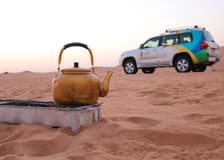 Abu Dhabi Sunrise Desert Safari with 4x4 Dune Bashing & Sandboarding