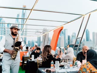 From Dubai Marina: 1.5-Hour Sunset/Dinner Cruise with Open Bar, Live Music & International Buffet — gallery 2