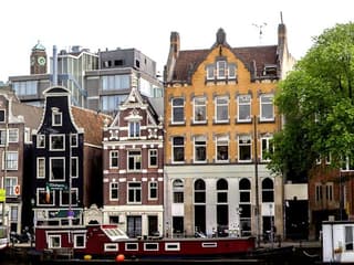 Roundtrip Bus from Schiphol Airport to Amsterdam City Center + Audio Guide App — gallery 1