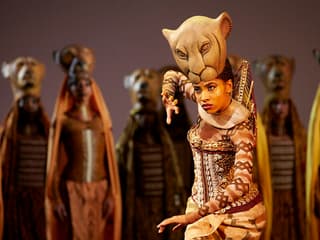 Performer in lioness costume during The Lion King West End show