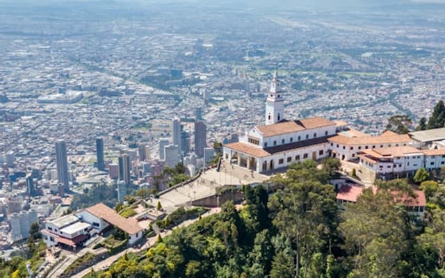 Aerial view of Monserrate sanctuary on the mountaintop above the city of Bogota