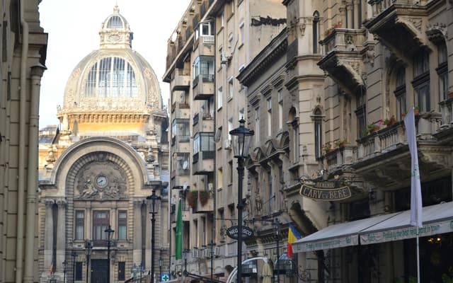 a city street filled with lots of tall buildings