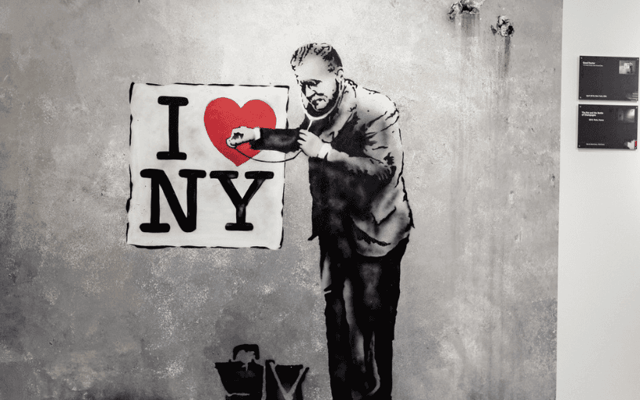 The Banksy Museum in New York City featuring iconic works of street art by the famous artist.