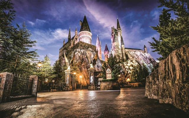 Hogwarts castle at dusk in Hogsmeade at Universal Islands of Adventure