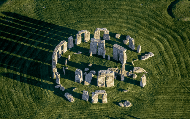 The prehistoric stone circle at Stonehenge on Salisbury Plain under an open sky