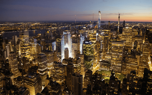 The Empire State Building above the Manhattan skyline on a summer evening